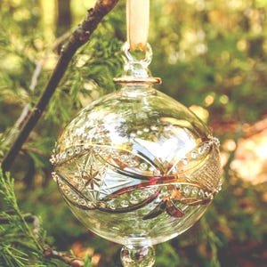 Egyptian Blown Glass Ornament, with gold accents and golden shapes. Elegant piece for you to decorate your areas